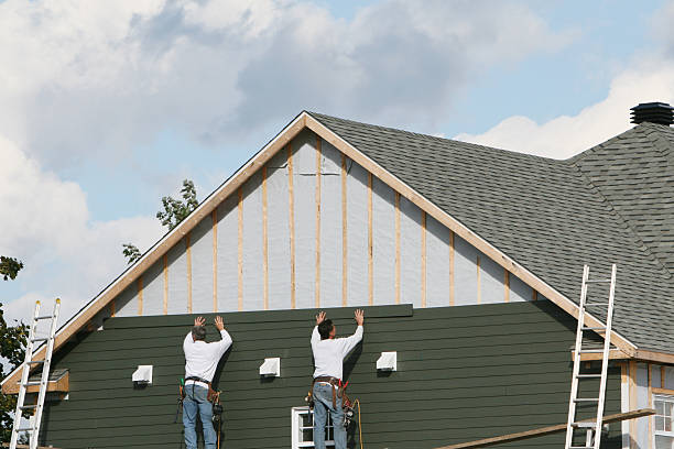 Professional Emergency Siding Repair technician working in Bellefontaine, OH